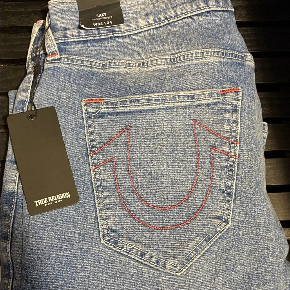True Religion Men’s Ricky Relaxed Jeans in Light Blue with Red Stitching